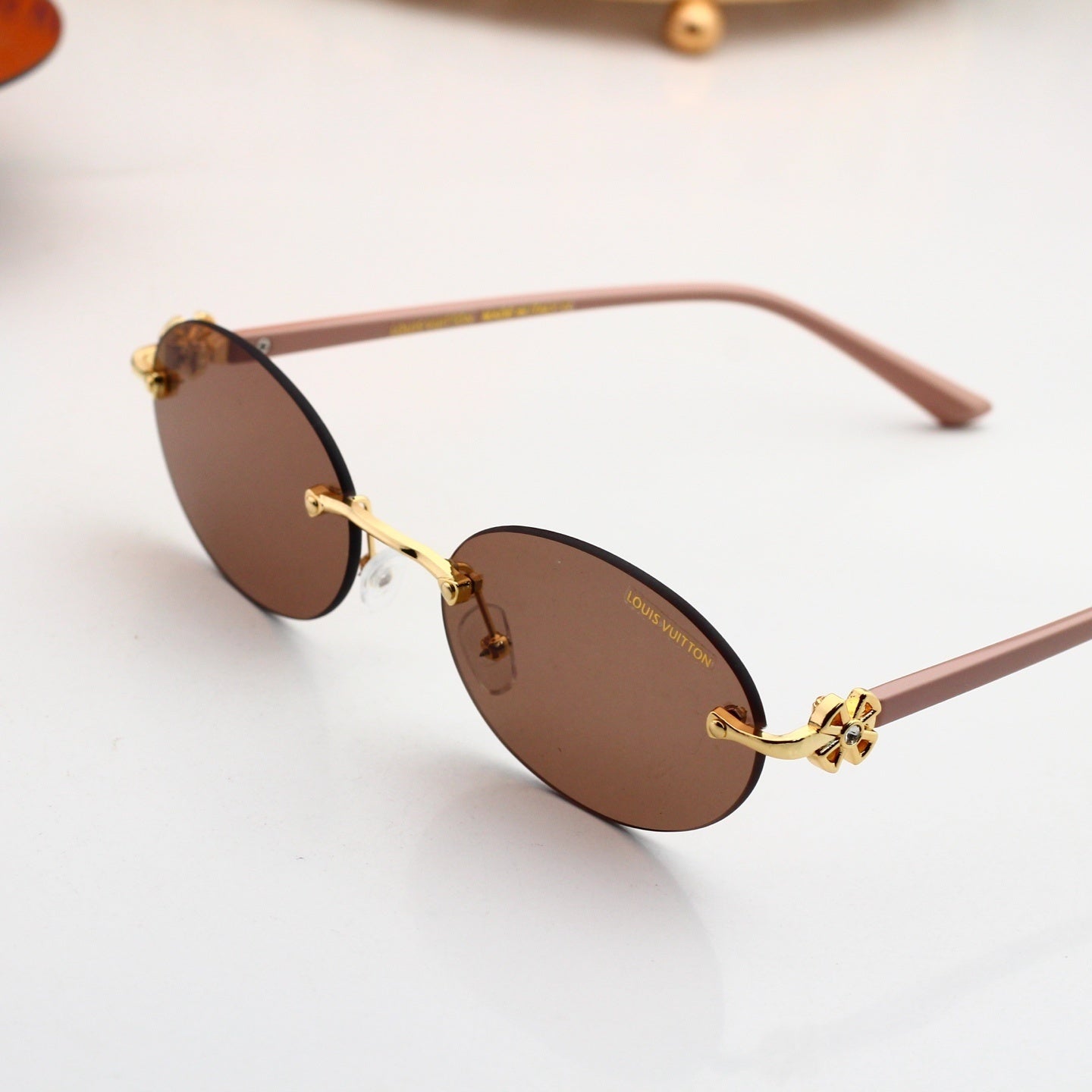 Rimless Oval Metal Temple Sunglasses 88093