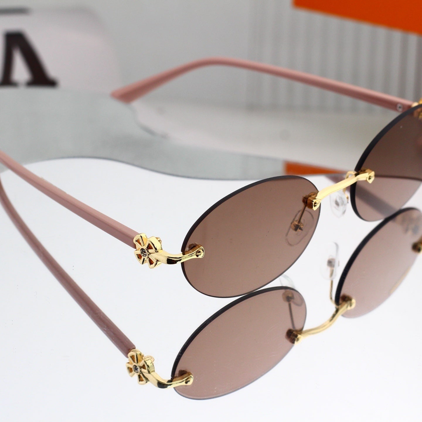 Rimless Oval Metal Temple Sunglasses 88093